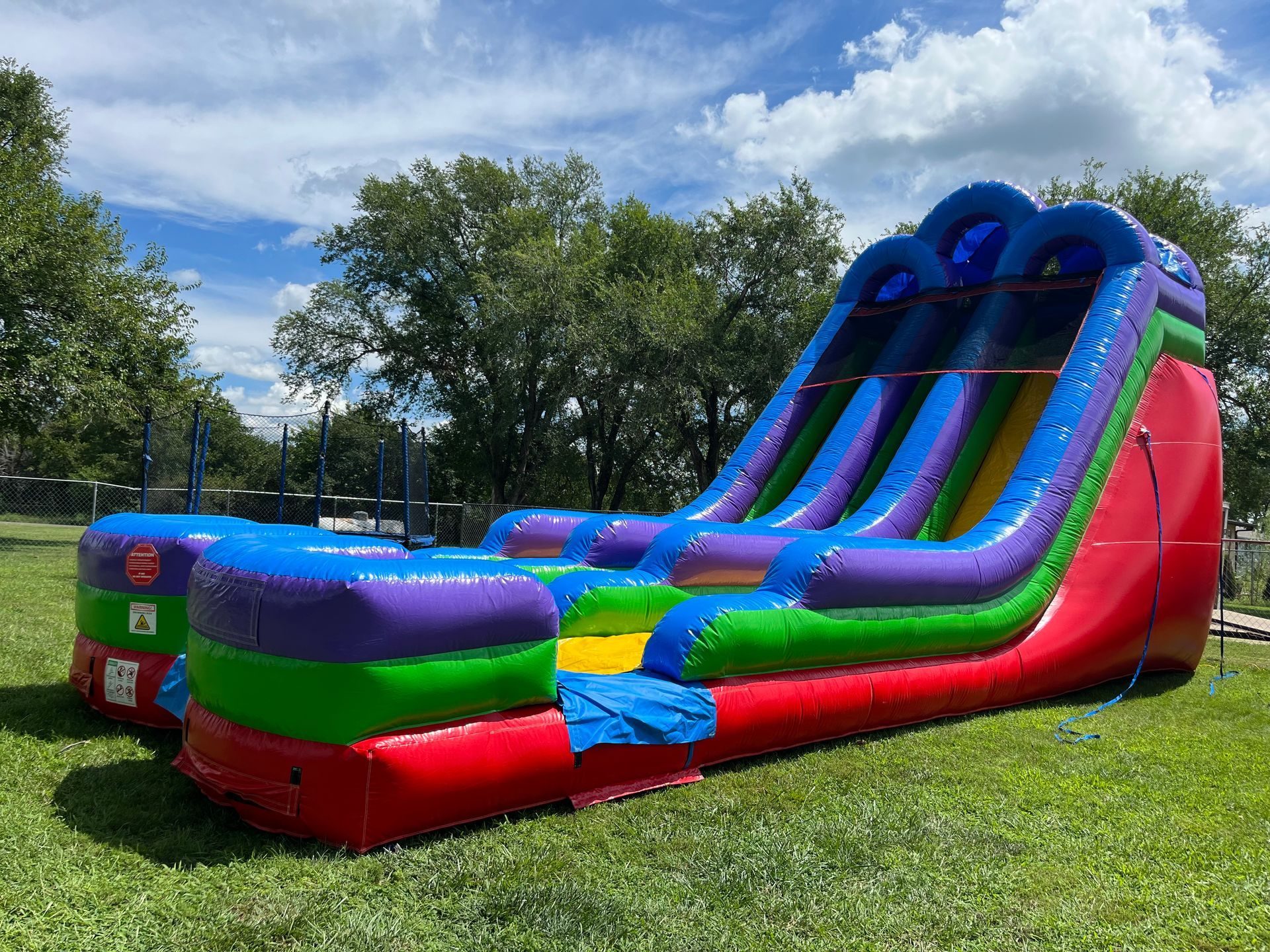 18' Retro Rainbow Waterslide inflatable rental in Topeka, Kansas