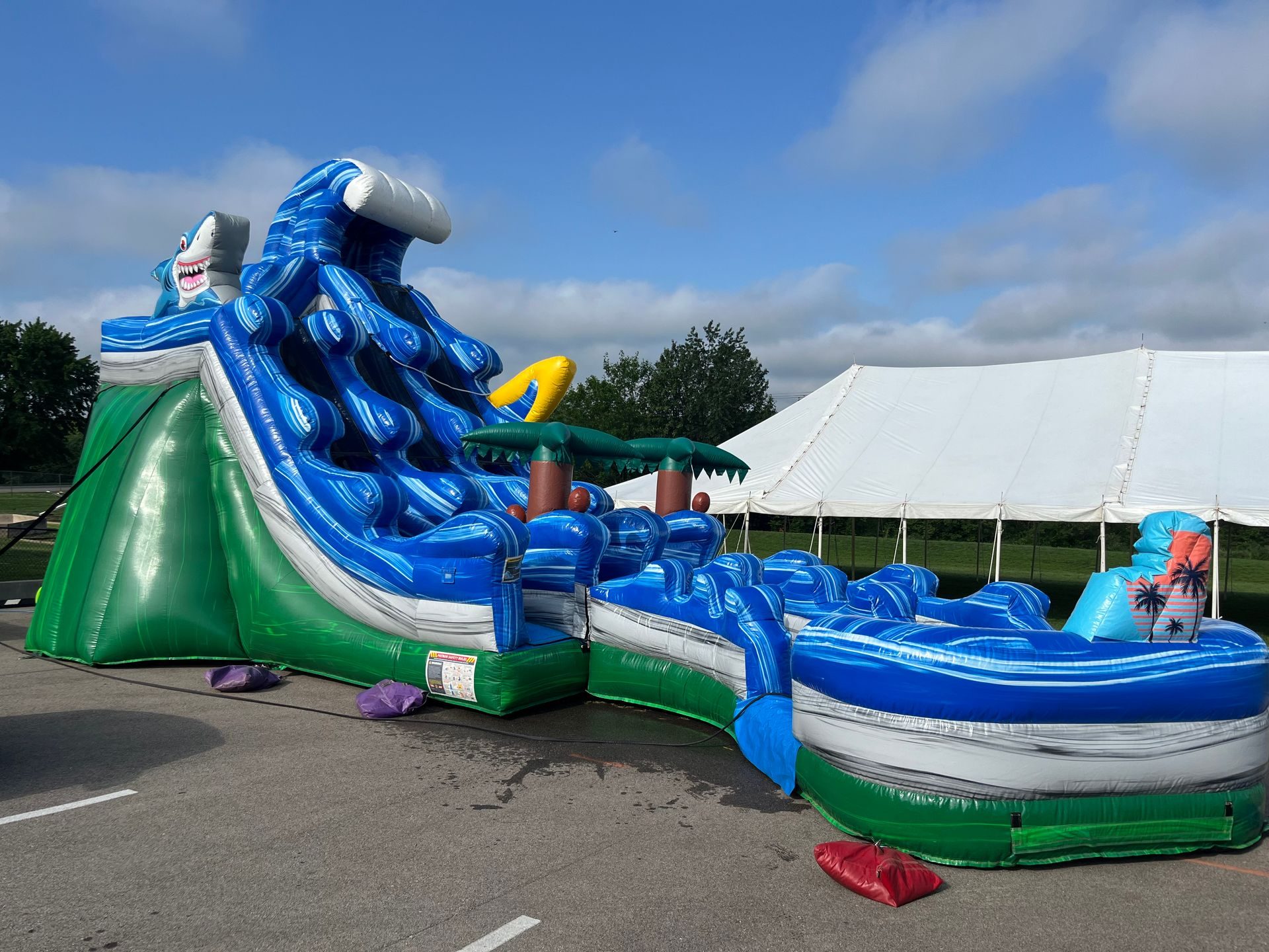 20' Curved Dual Lane Waterslide inflatable rental in Topeka, Kansas