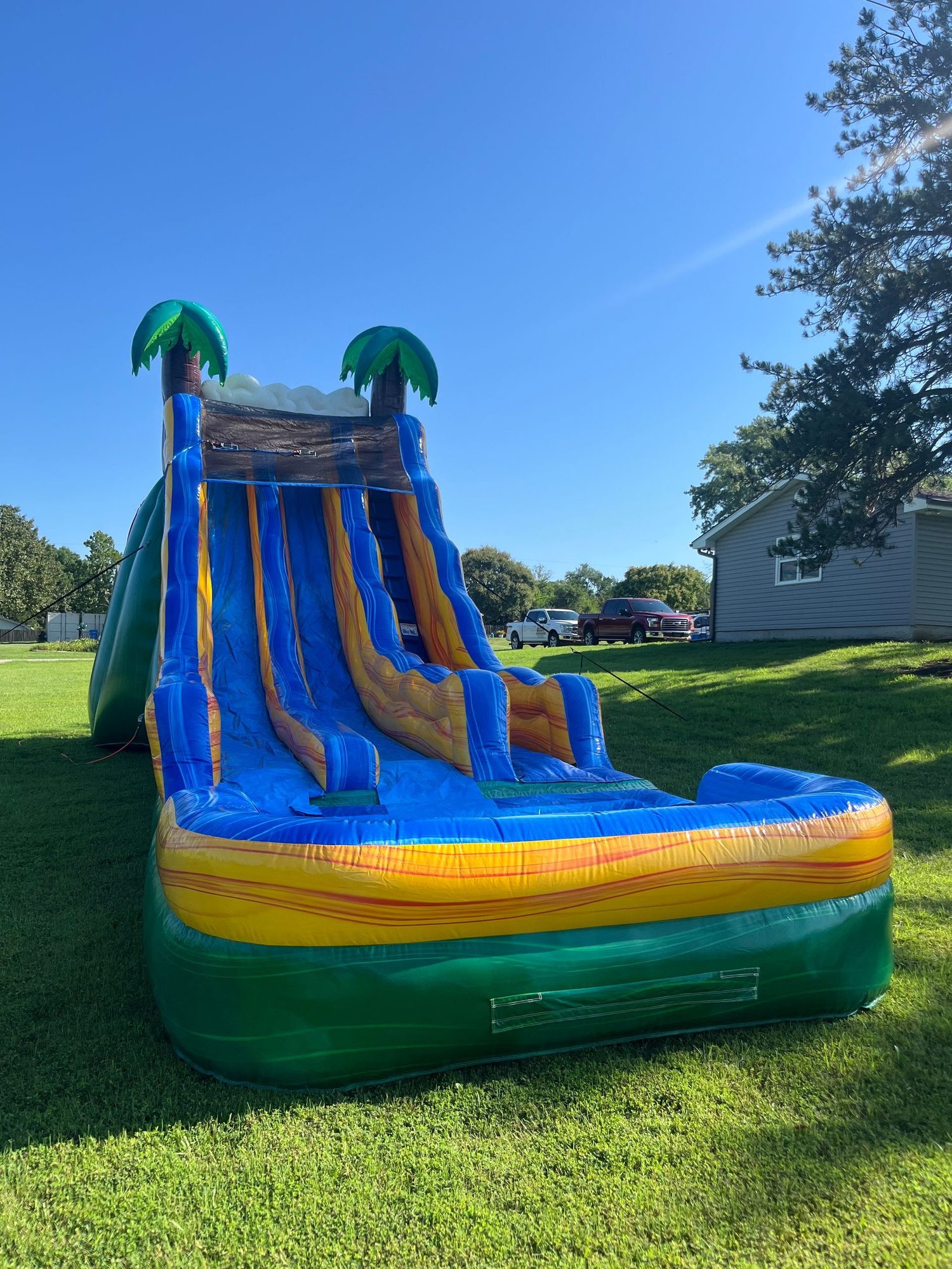 20' Tropical Wave Dual Waterslide inflatable rental in Topeka, Kansas