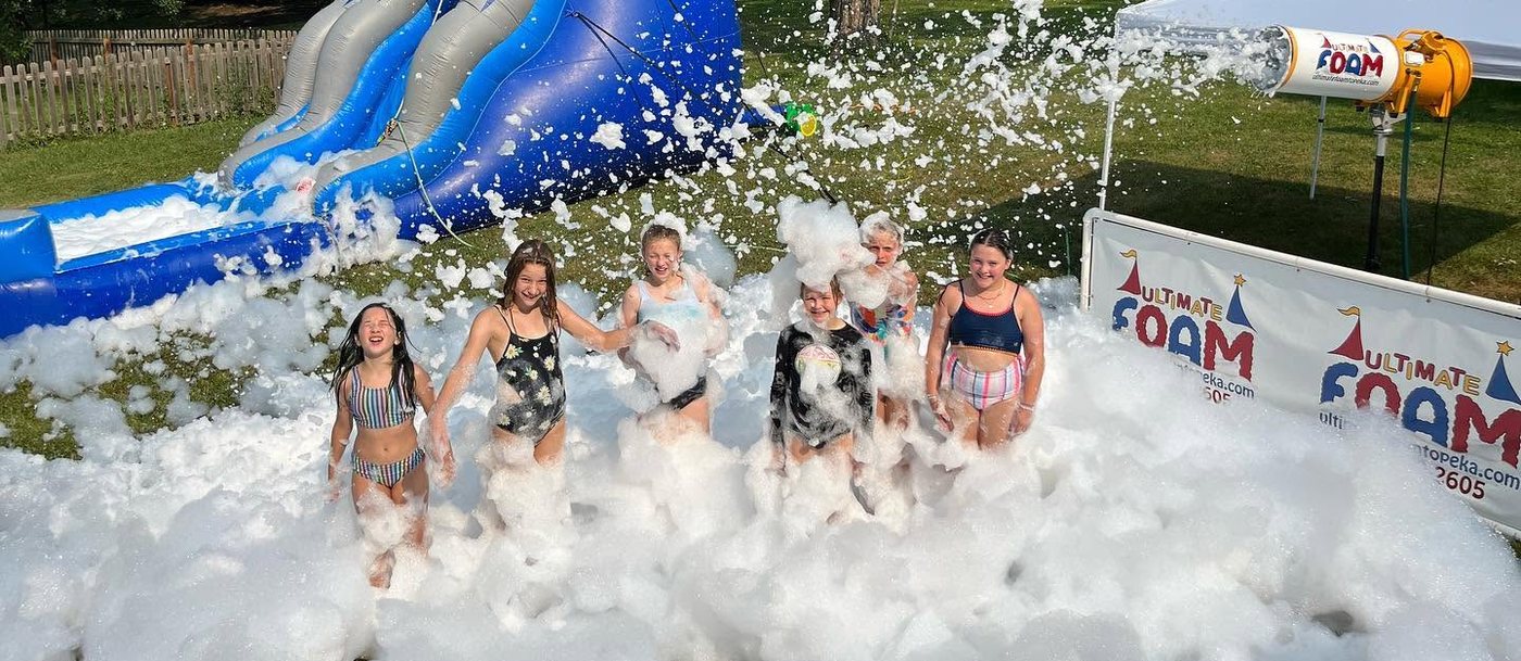 Kids playing in an Ultimate Foam foam party in Topeka, Kansas